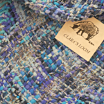 Hand-woven shades of blue fashion bib at Clara's Loom. @FanningSparks