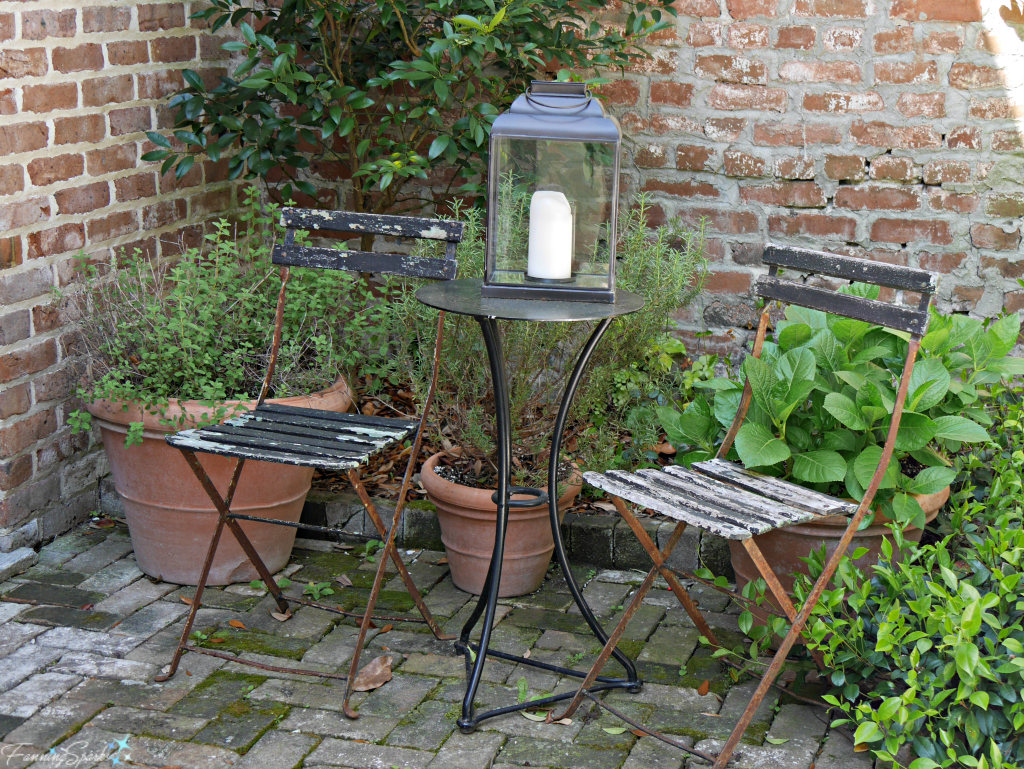 Cafe table and chairs in garden corner @FanningSparks