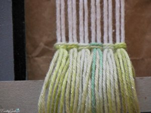 Rya knots form first row of fringe on the DIY woven statement necklace. @FanningSparks