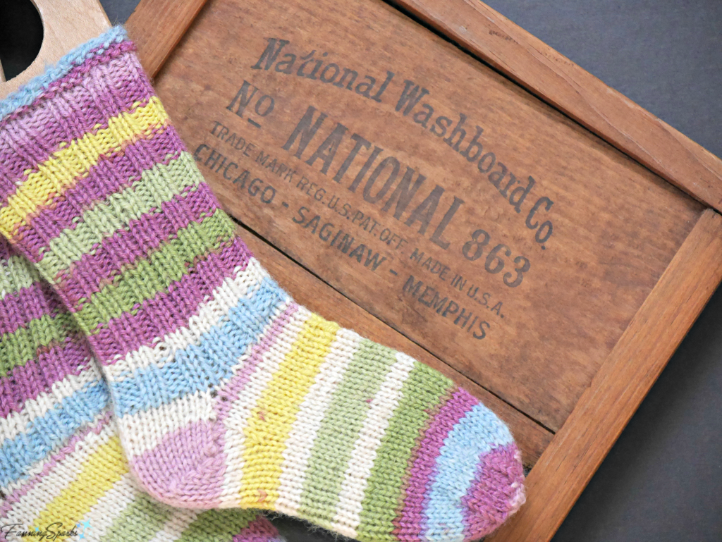 Hand knit socks with vintage washboard. @FanningSparks