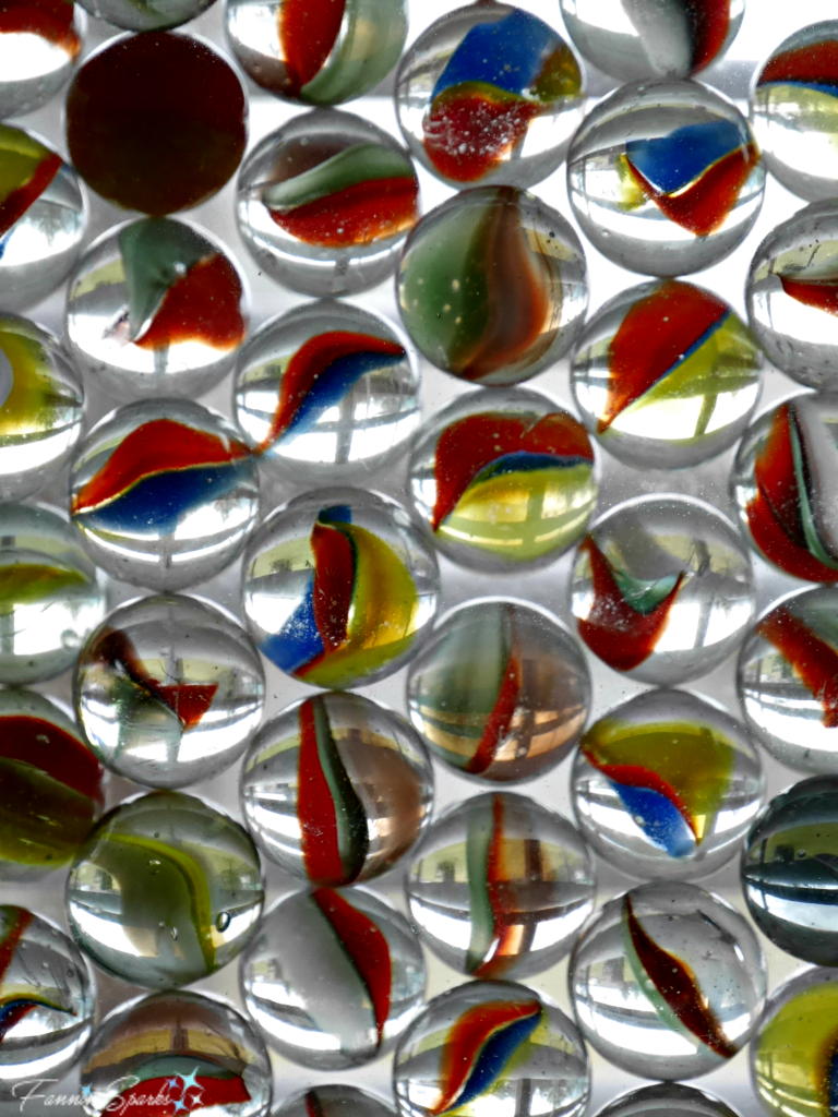 Marbles framed in front of window light @FanningSparks