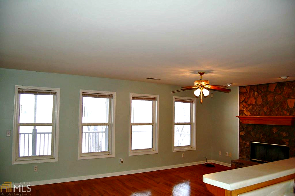 Living room showing window wall. @FanningSparks