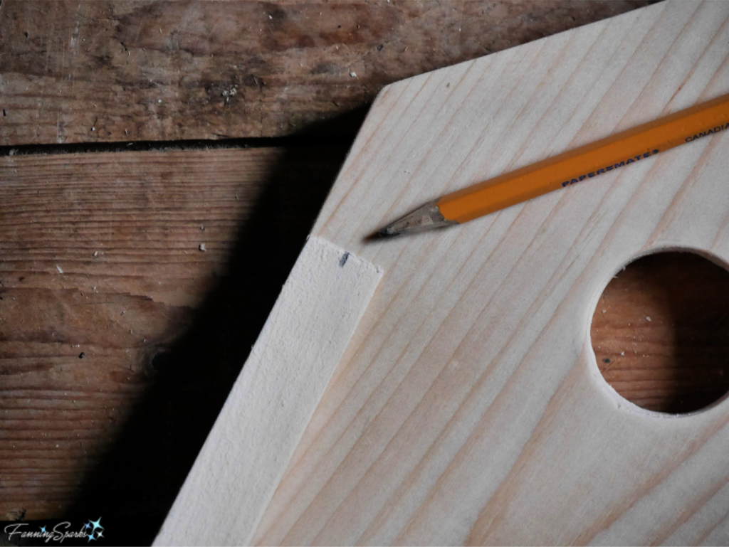 TIP:  Find Center on a Piece of Scrap Wood and Use to Mark for Screw Placement.  Part of DIY Bluebird-Approved Birdhouse Tutorial at FanningSparks.   @FanningSparks