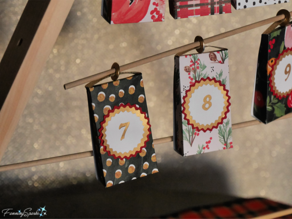 Sliding Gift Packets onto Dowels of Tabletop Tree / Advent Calendar.   @FanningSparks