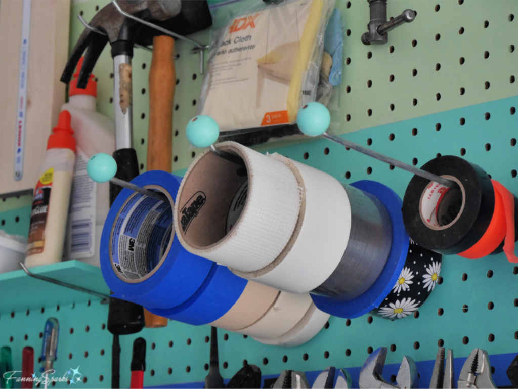 Tip 6 to Gussy Up a Workshop – Cover Protruding Pegboard Hooks.  @FanningSparks