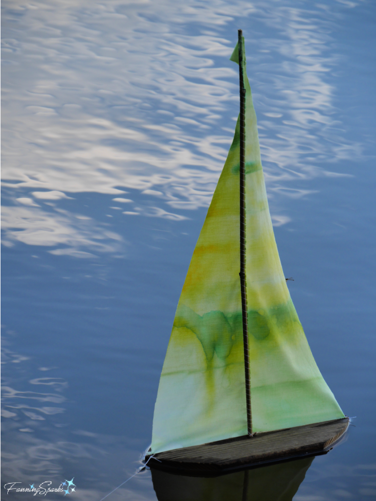 Yellow and Green Landlubber Toy Sailboat on Lake Oconee   @FanningSparks