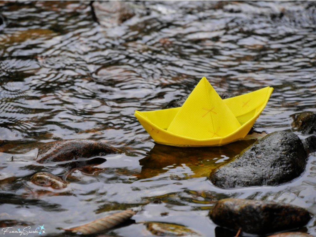 Yellow Folded Boat Racing in Stream    @FanningSparks