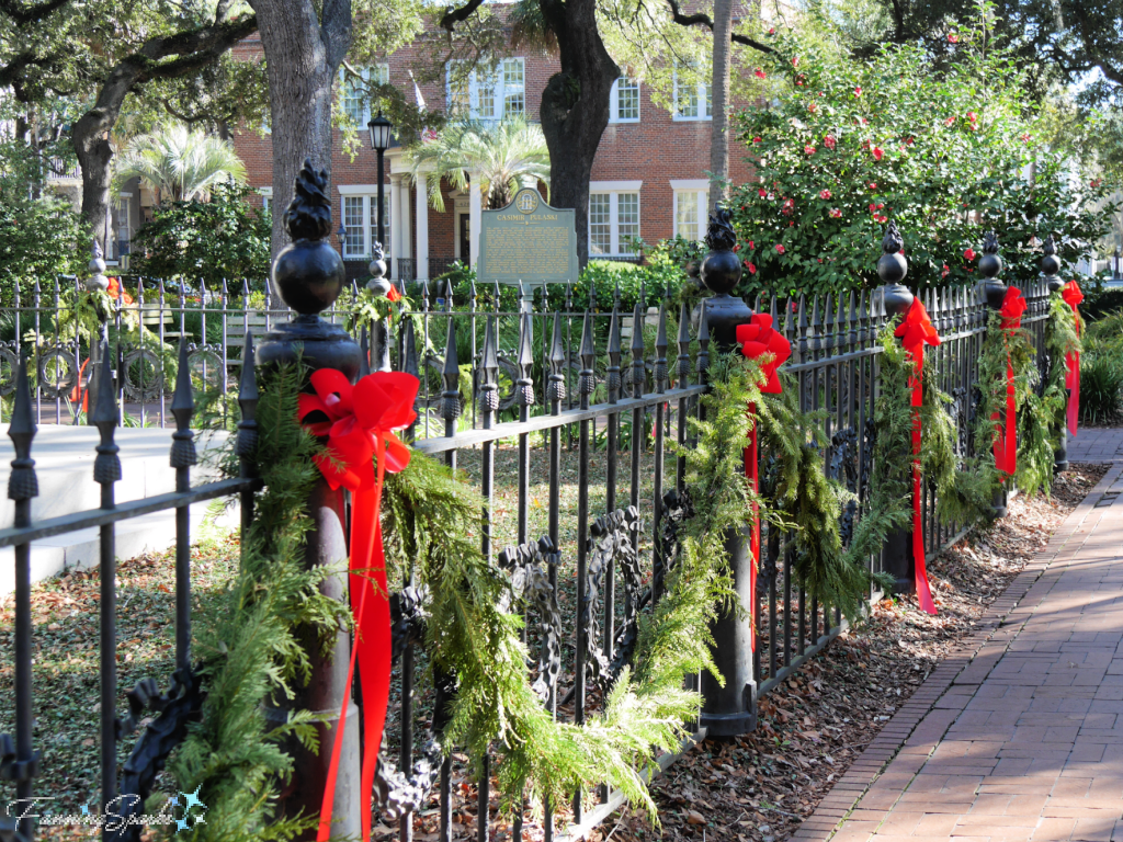 Garland and Bows on Cast Iron Fence   @FanningSparks