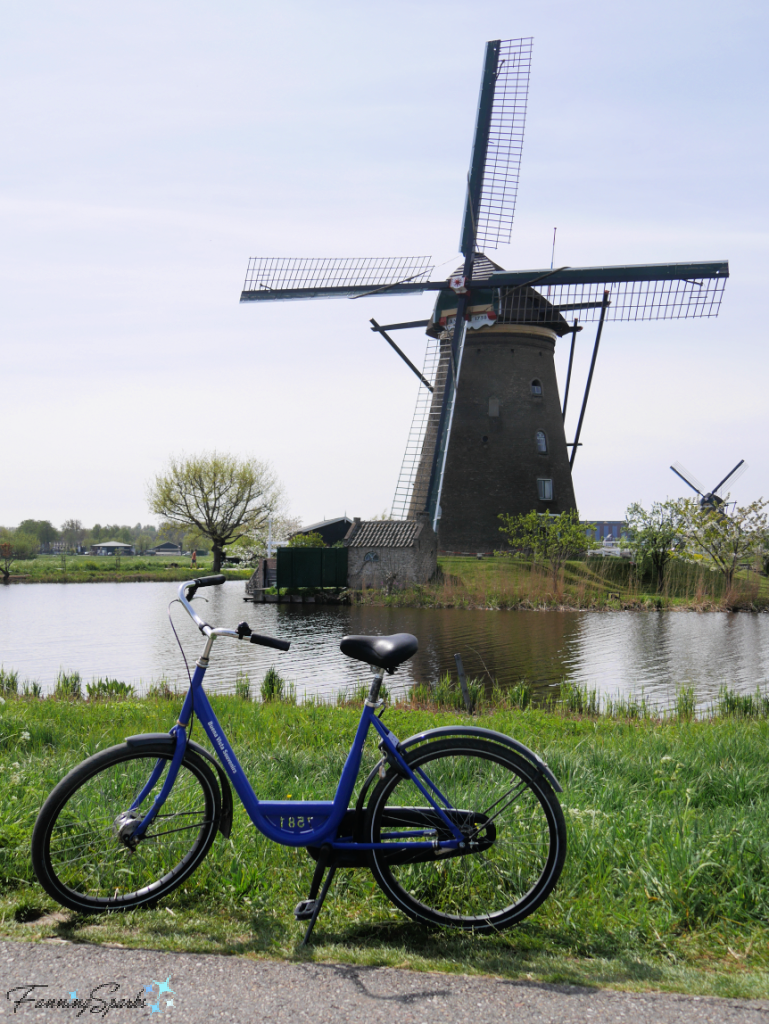 Single Bike in Front of Kinderdijk Windmill   @FanningSparks