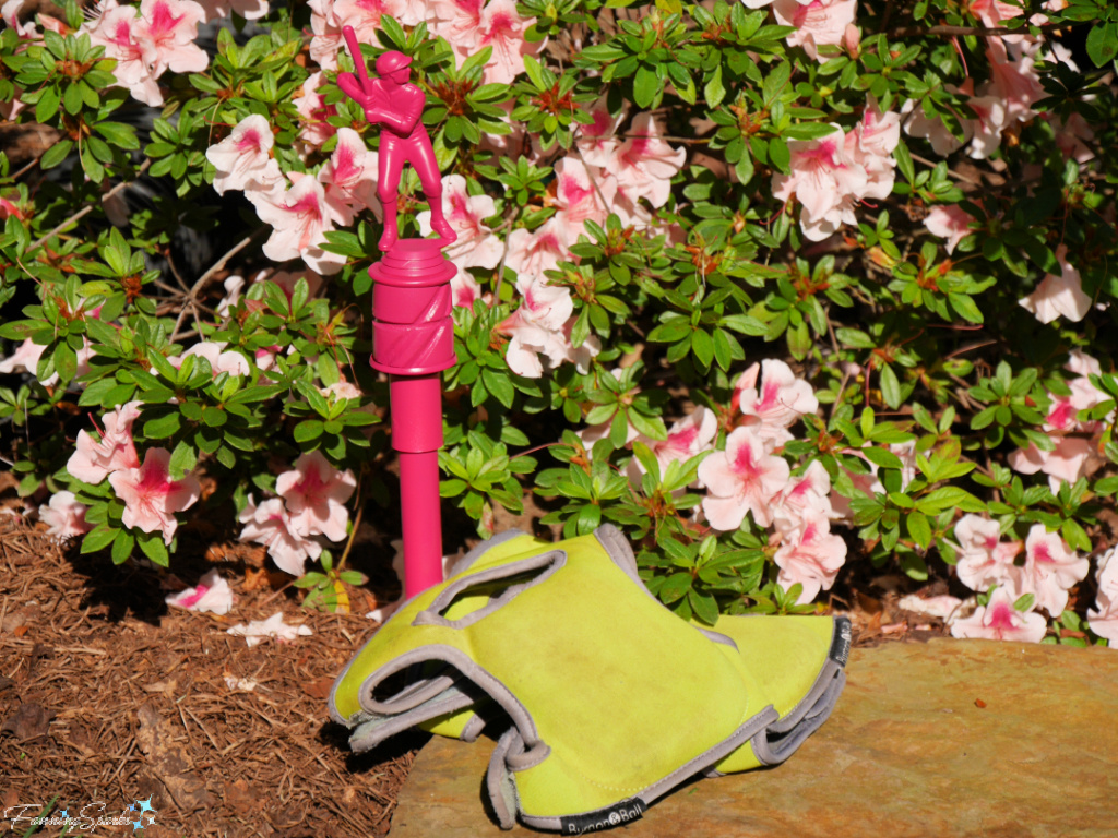 My Favorite Gardening Knee Pads Beside Trophy-Topped Hose Guard   @FanningSparks