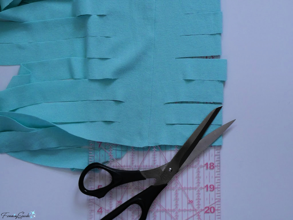 Making T-Shirt Yarn – Slide Ruler Under 1-inch Strips at Uncut Fold   @FanningSparks