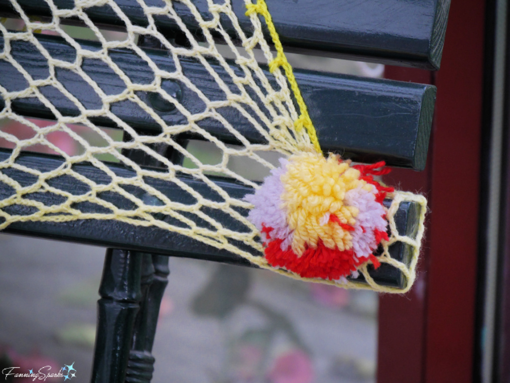 Bench Covered in Pompoms and Crochet Yarn Bomb at Municipal Library of Aveiro Portugal   @FanningSparks   