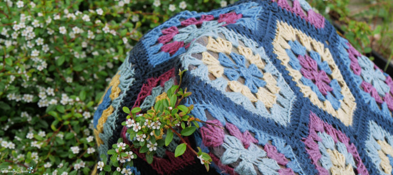 Rock Covered in Granny Hexagon Crochet Yarn Bomb in Quidi Vidi Newfoundland @FanningSparks