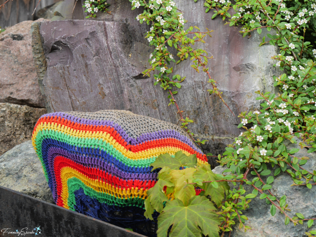 Rock Covered in Bright Striped Crochet Yarn Bomb in Quidi Vidi Newfoundland   @FanningSparks   