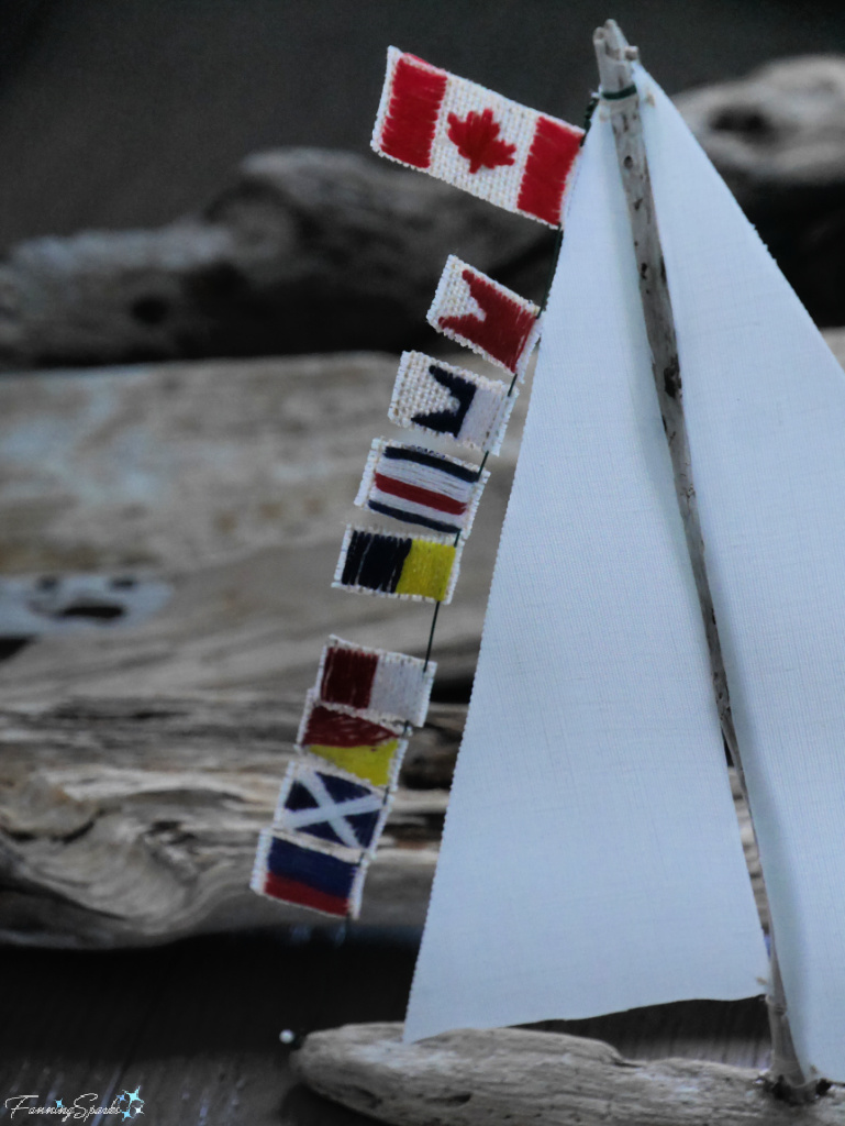 Signal Flags Spell Back Home on My Driftwood Sailboat with Driftwood   @FanningSparks