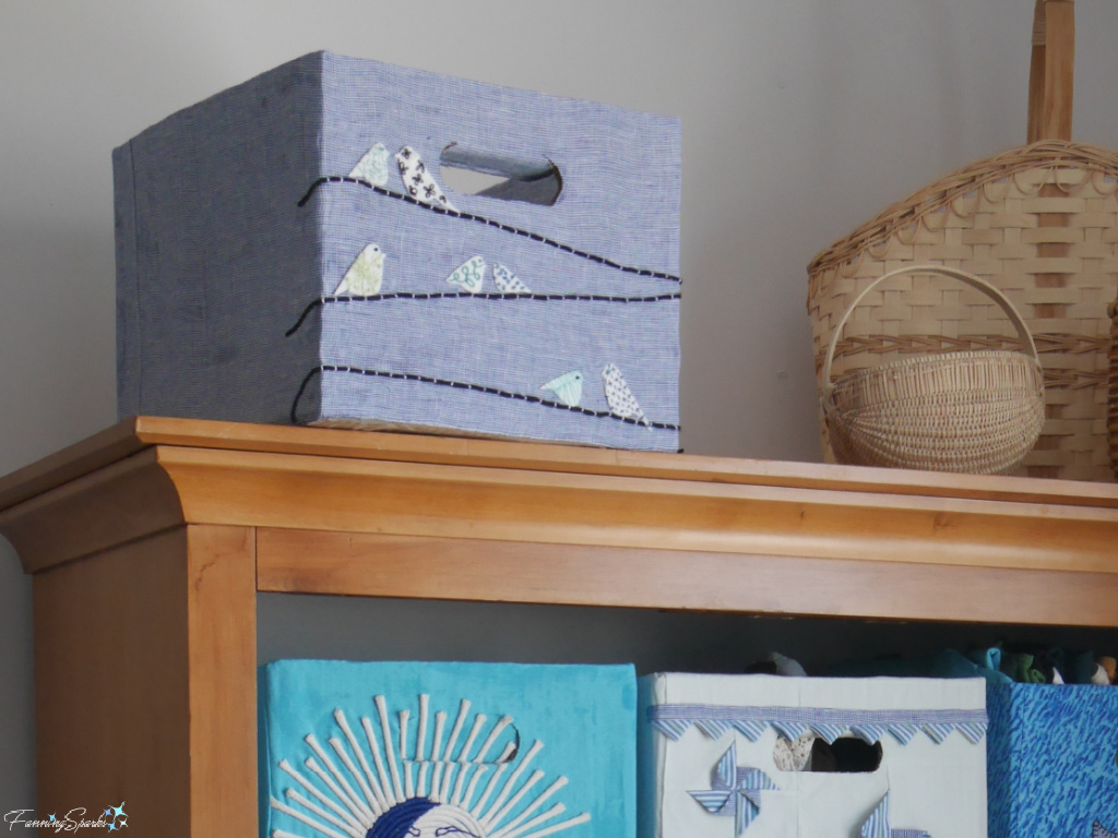Repurposed Cardboard Storage Bin with Embroidered Birds On Cabinet   @FanningSparks