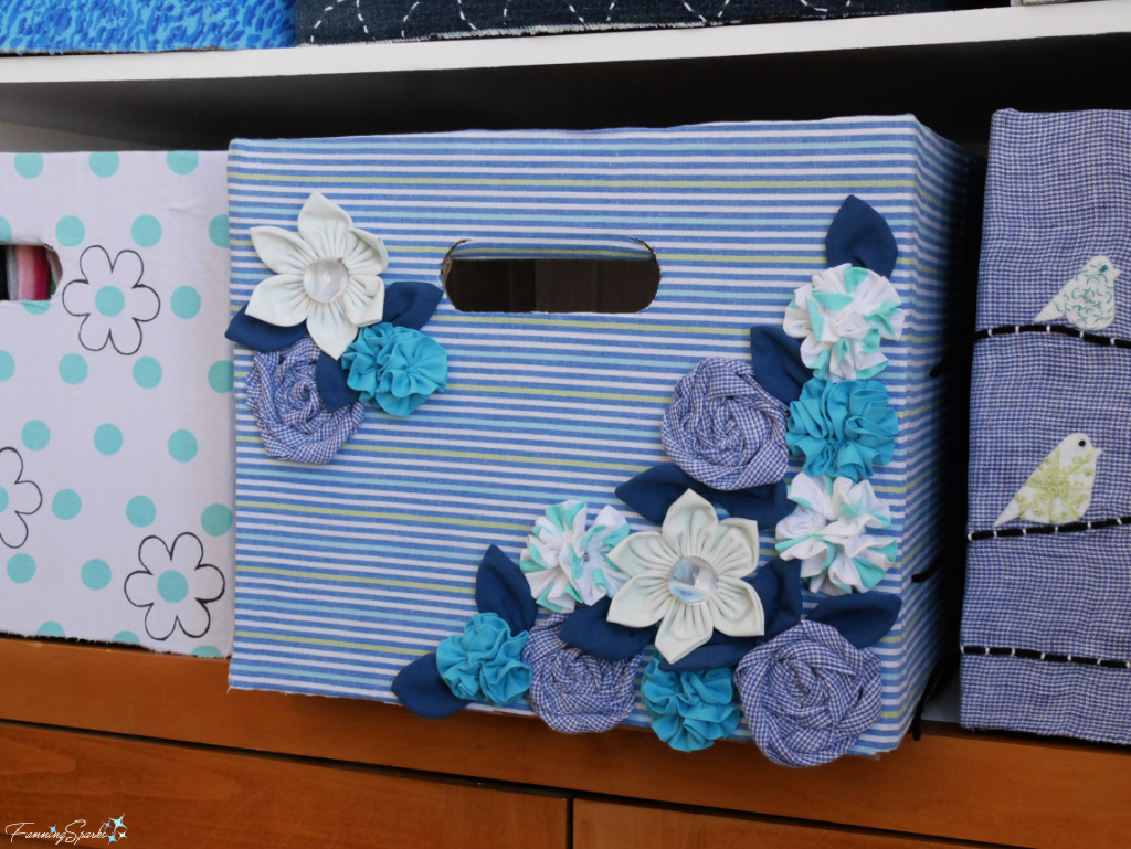 Repurposed Cardboard Storage Bin with Fabric Flowers   @FanningSparks