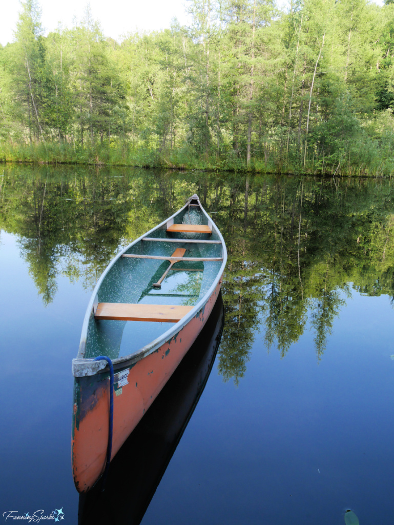 Canoe on Pond at Domaine Jolivent in Lac-Brome @FanningSparks