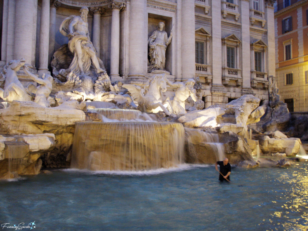 Worker Removing Coins from Trevi Fountain in Rome Italy   @FanningSparks