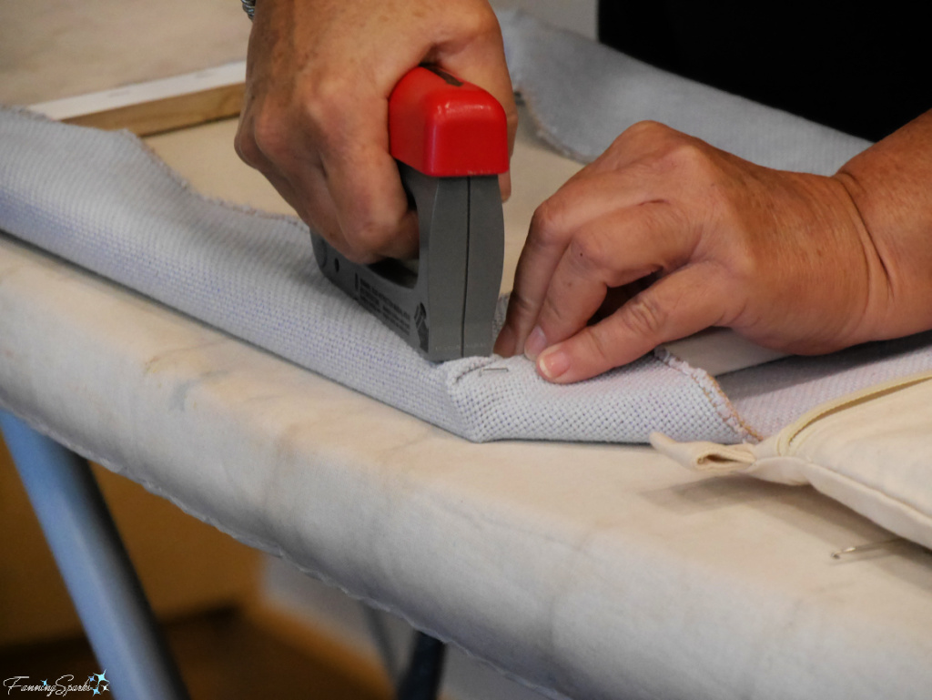 Stapling Hooked Rug to Frame at Periwinkle Laine Rug Hooking Workshop   @FanningSparks