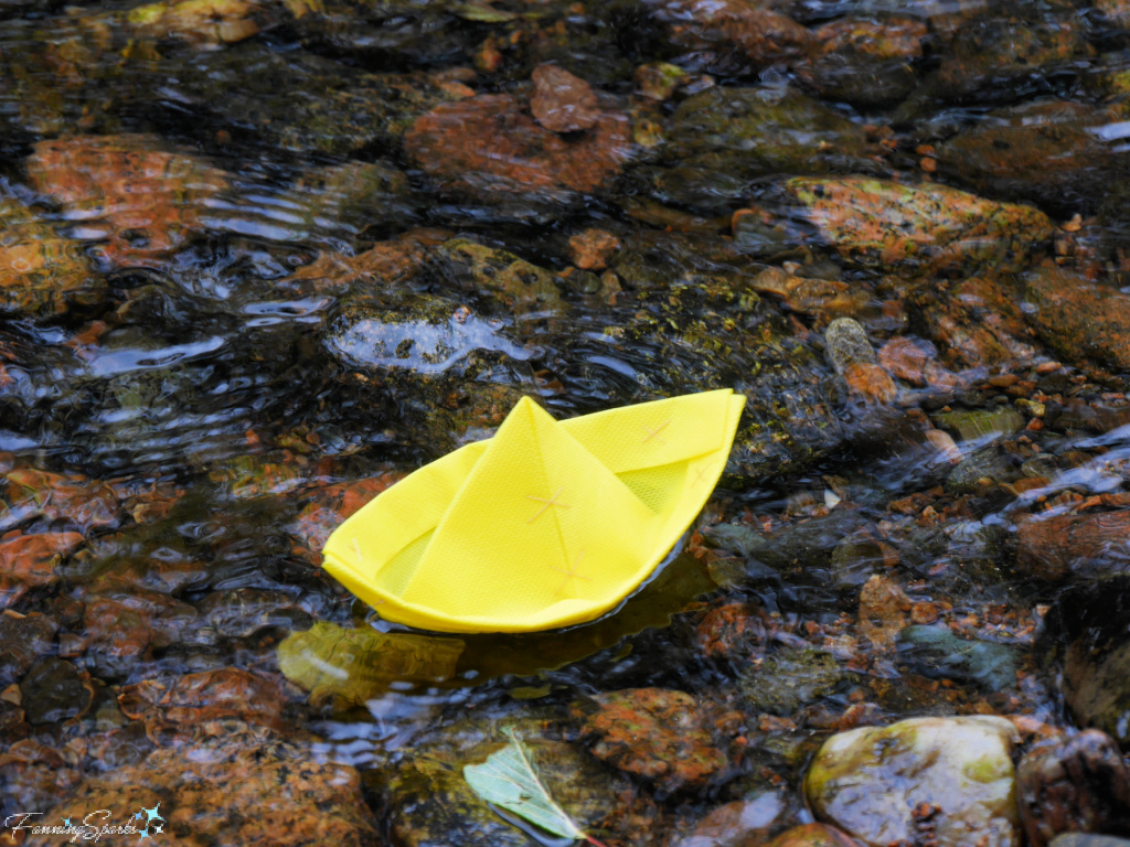 Yellow Folded Boat Floating Down Stream  @FanningSparks